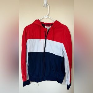 Size S windbreaker. Multi colored (Red, White, Blue) Very light wear.